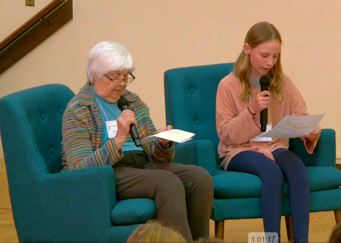 Ginny and Bridget sitting together on sanctuary stage