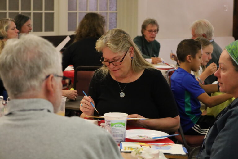 Cindy Domenico, along with other members of First Church, watercolor painting